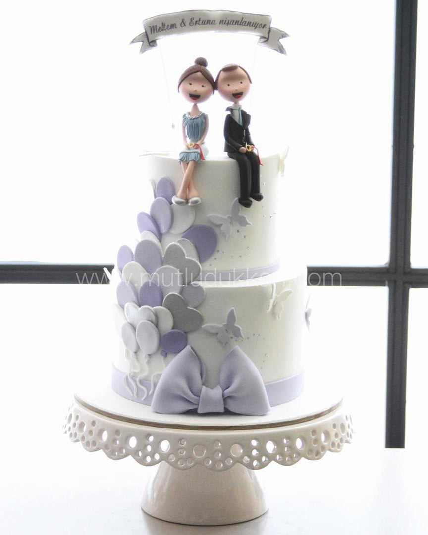nişan pastası – kadın ve erkek figürlü balon süslemeli pasta