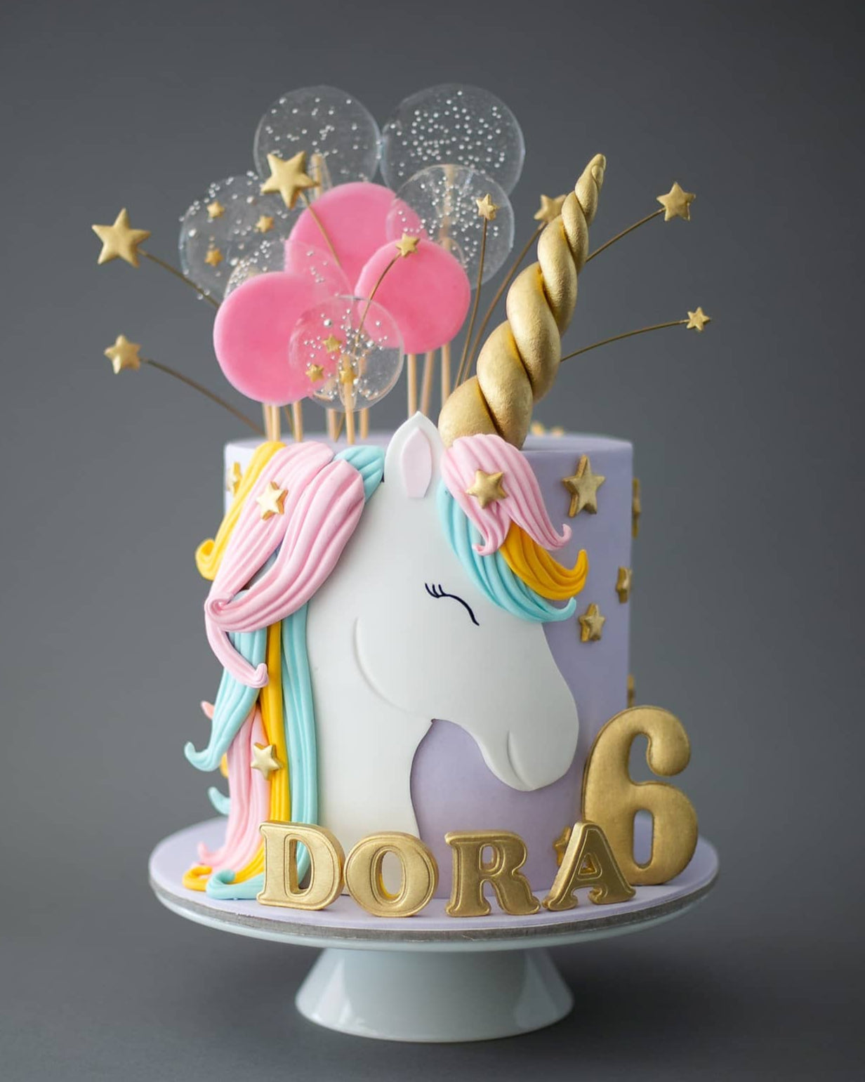unicorn pasta – pembe lolipop süslemeli kız çocuk pastası